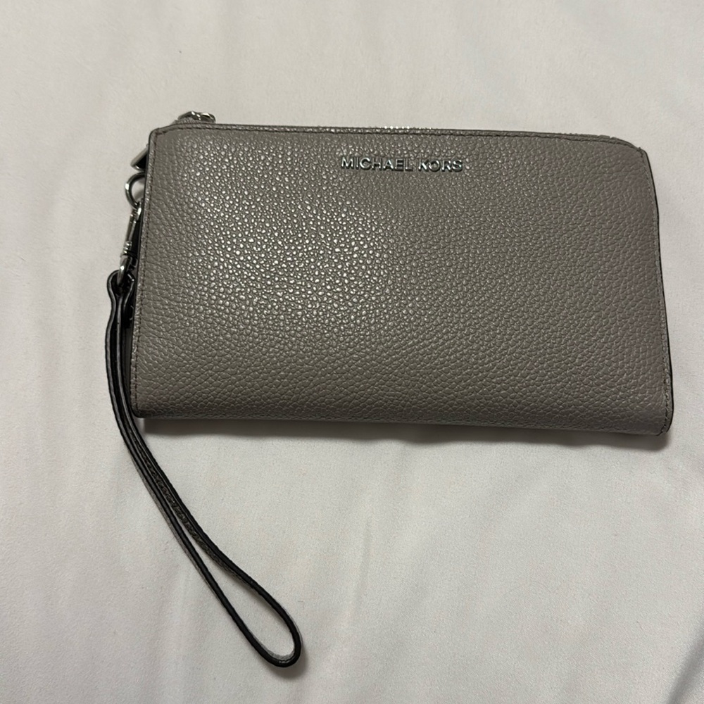 Michael Kors grey wristlet. Excellent condition.
